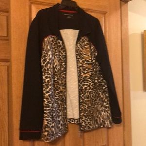 Black jacket with printed front and pockets.